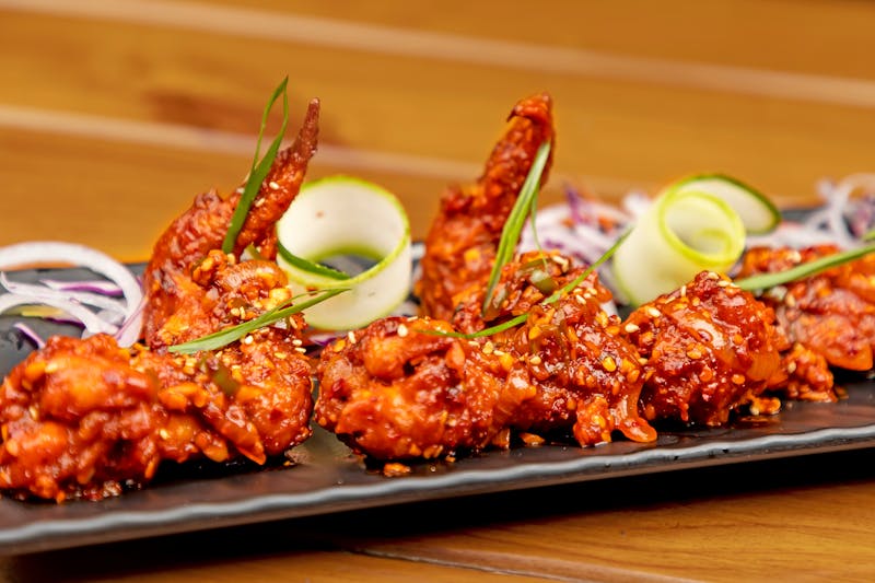 Snob Sauce Tenders drenched in Wing Snob signature sauce